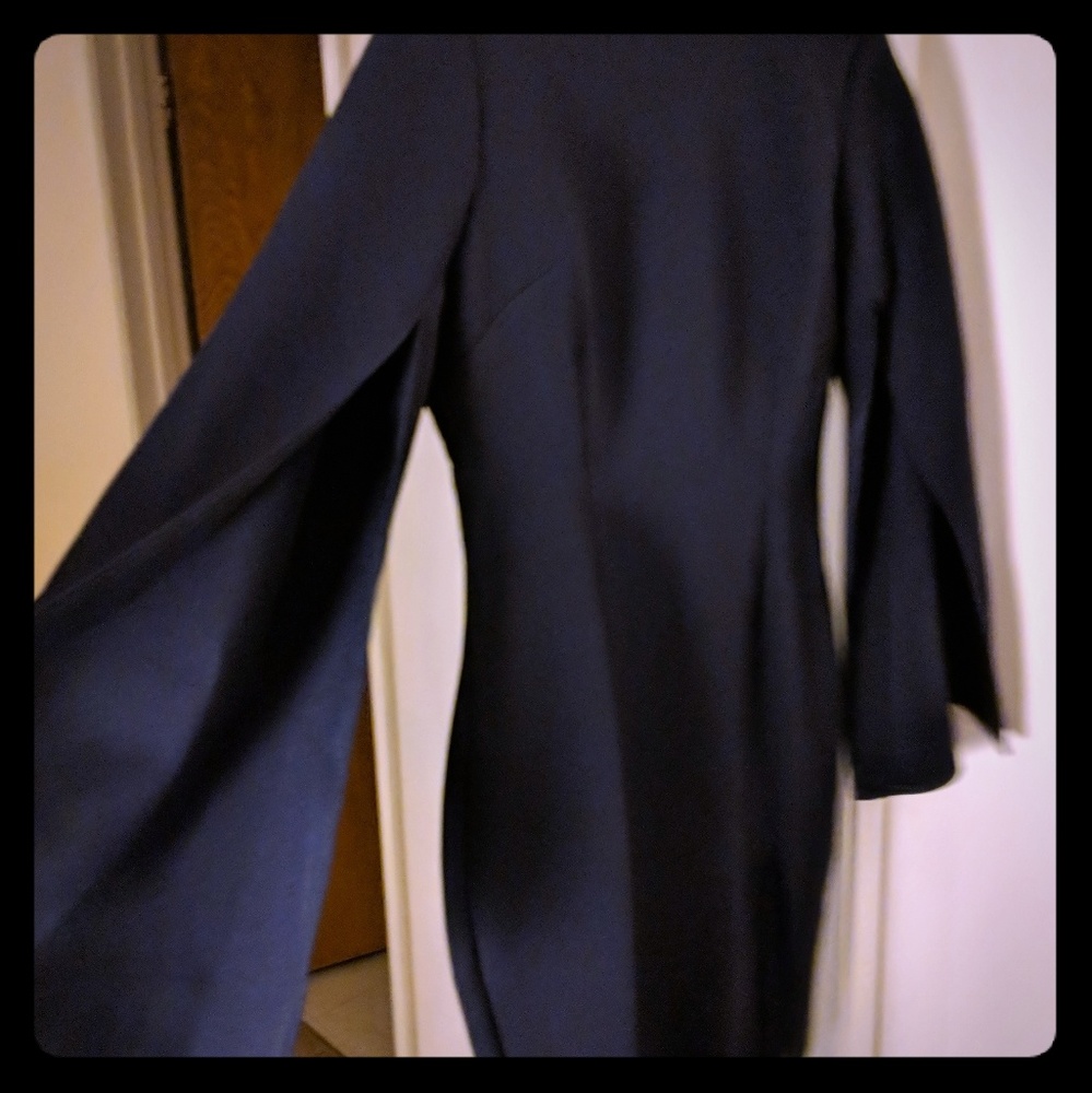 Bodycon dress with slit bell sleeves